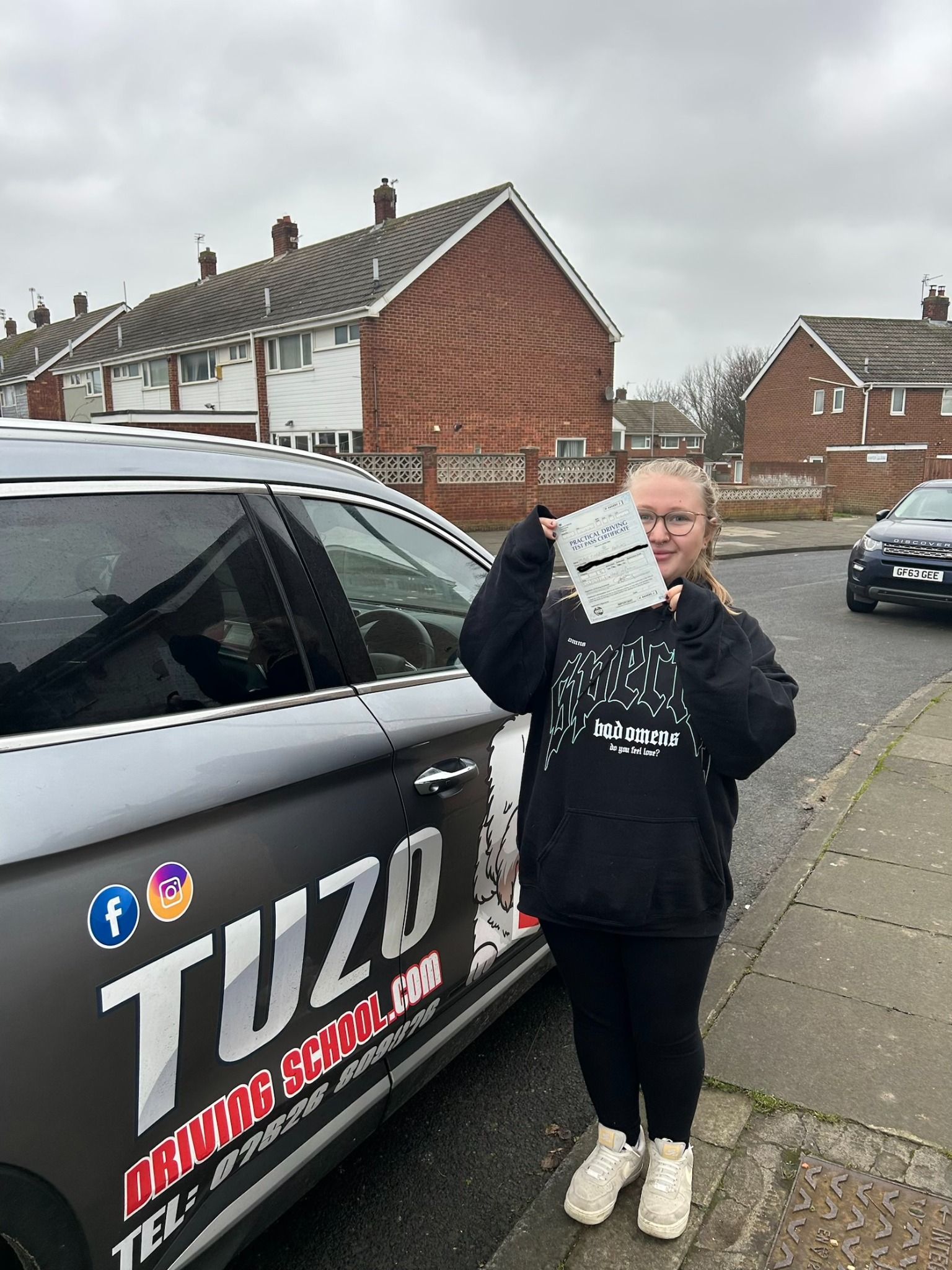 Charlotte after passing their driving test